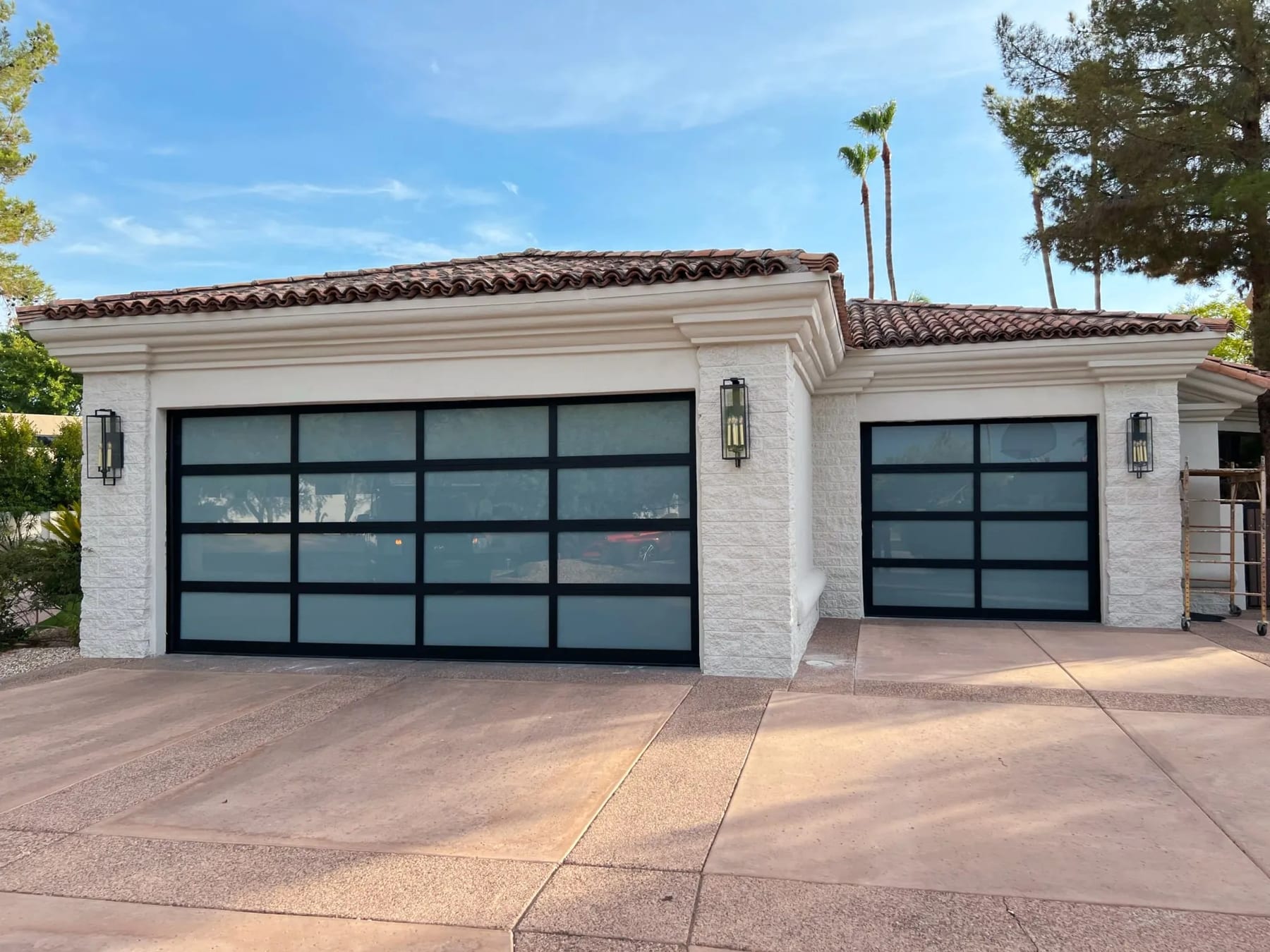 Full-view glass garage doors installed by Morning Star on a Scottsdale home